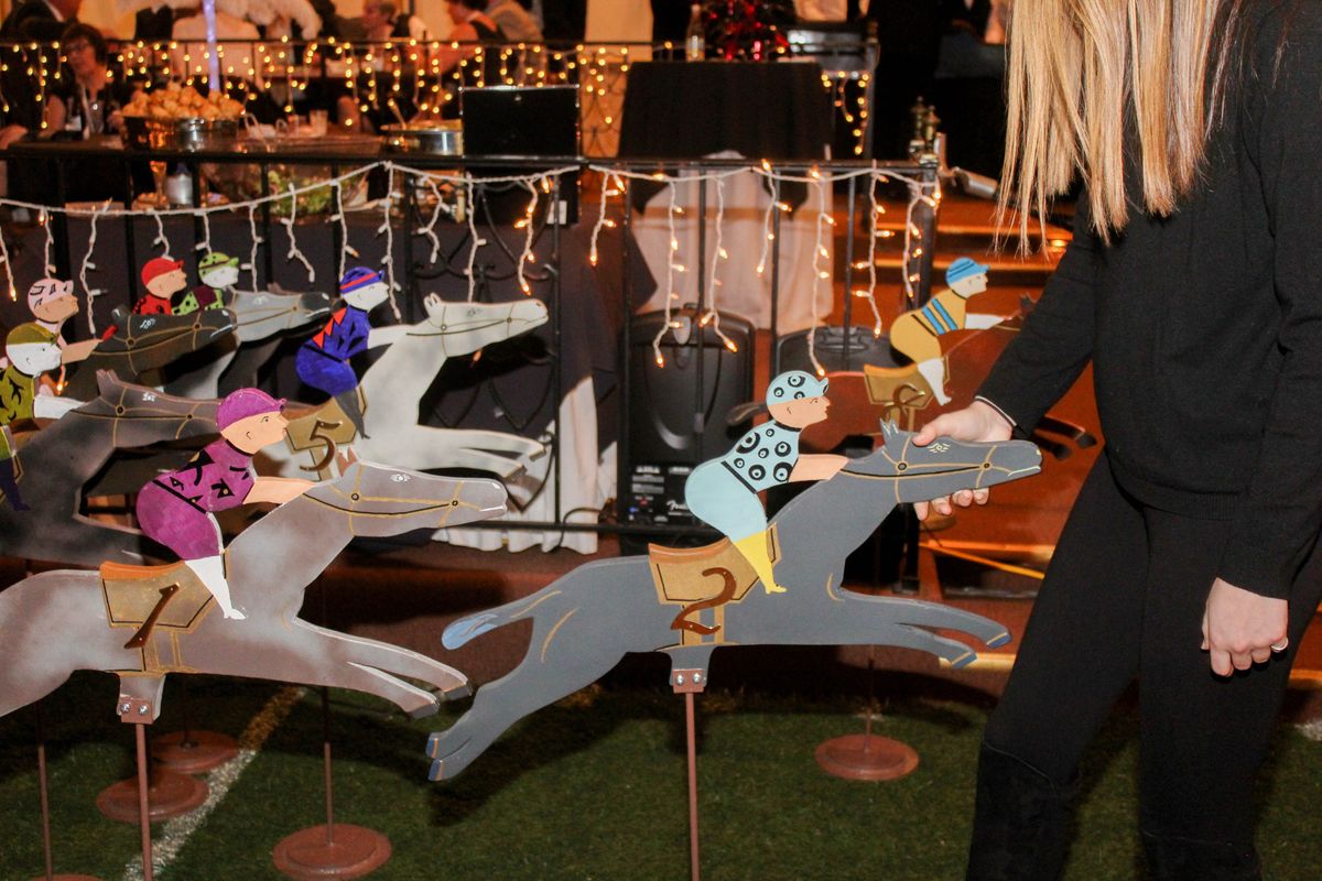Derby Dash full race in progress at a formal gala - Metro Casino Events