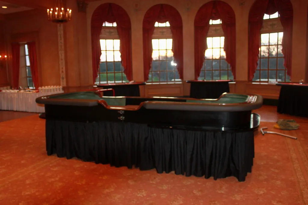 Casino tables arranged in a ballroom